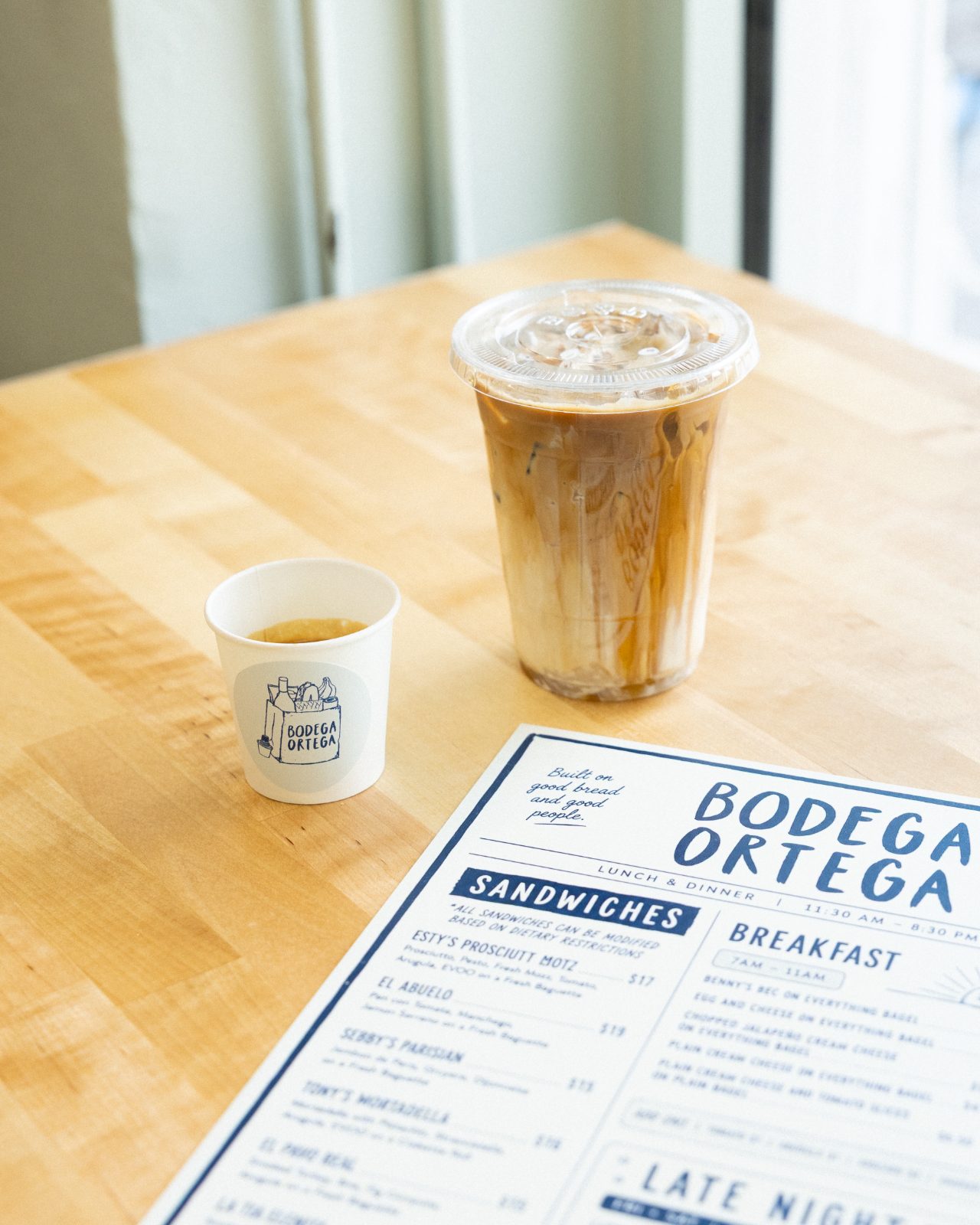 Iced coffee and menu on the counter